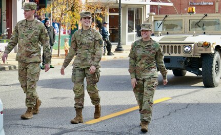 Illinois Army National Guard Cpl. Miah Sally, Private 1st Class Breanne Kidd and Private Drew Tipton-Hicks march in the Quincy (Illinois) Veterans Day Parade on Nov. 4.