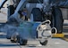 Airman 1st Class Seth Quillen, 5th Aircraft Maintenance Squadron crew chief, pushes a liquid oxygen (LOX) cart into position at Minot Air Force Base, North Dakota, Nov. 2, 2023. LOX carts allow Team Minot’s aircraft maintainers to transport LOX to the B-52H Stratofortress safely. (U.S. Air Force photo by Airman 1st Class Kyle Wilson)