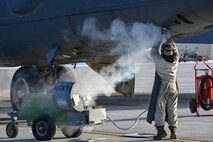 Airman 1st Class Seth Quillen, 5th Aircraft Maintenance Squadron crew chief, disconnects a liquid oxygen (LOX) hose from a B-52H Stratofortress at Minot Air Force Base, North Dakota, Nov. 2, 2023. The aircraft’s systems convert LOX into a gaseous form, providing oxygen to the aircrew during flight. (U.S. Air Force photo by Airman 1st Class Kyle Wilson)