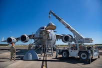U.S. Air Force crew chiefs with the 437th Aircraft Maintenance Squadron attach a new nose to a C-17 Globemaster III at Joint Base Charleston, South Carolina, Sept. 17, 2023.