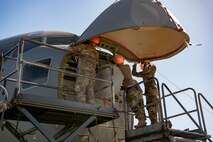 U.S. Air Force crew chiefs with the 437th Aircraft Maintenance Squadron attach a new nose to a C-17 Globemaster III at Joint Base Charleston, South Carolina, Sept. 17, 2023.