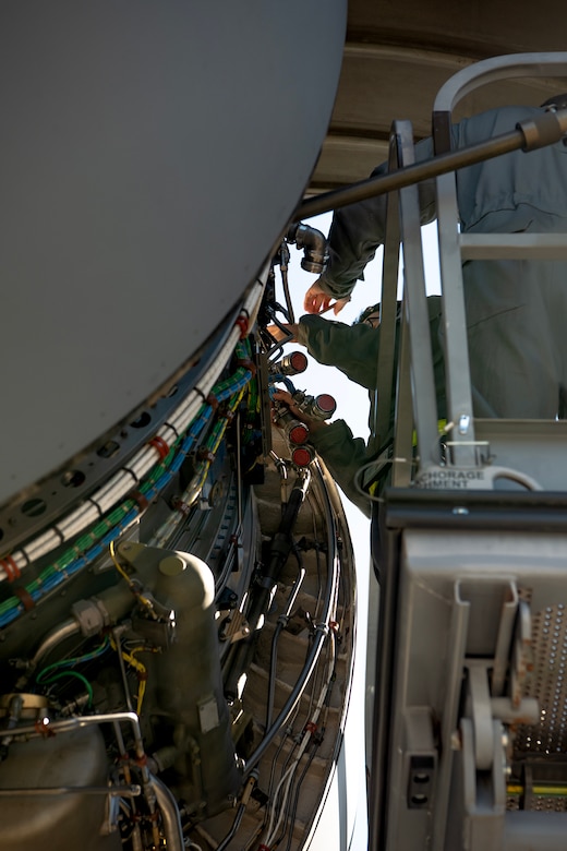 U.S. Air Force Airmen with the 437th Aircraft Maintenance Squadron repair the engine electronic control on a C-17 Globemaster III at Joint Base Charleston, South Carolina, Sept. 17, 2023.