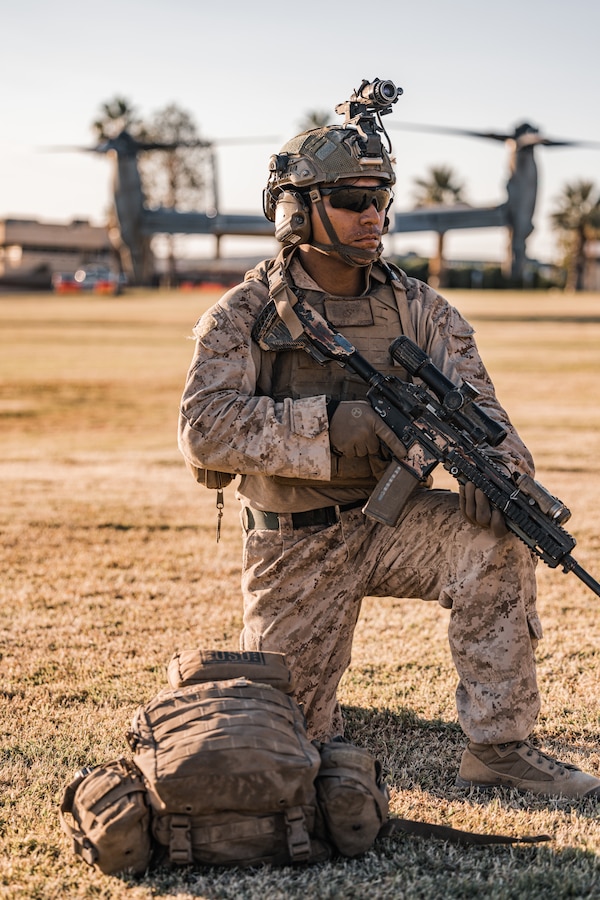 U.S. Marine Corps Lance Cpl. Joseph Gonzalez, an infantry Marine with 3rd Battalion, 2nd Marine Regiment, 2nd Marine Division, posts security during a noncombatant evacuation operation exercise as part of Weapons and Tactics Instructor Course 1-24 at Lance Cpl. Torrey Gray Field, Marine Corps Air-Ground Combat Center, Twentynine Palms, California, Oct. 20, 2023. WTI, hosted by MAWTS-1, is a seven-week course providing standardized advanced tactical training and certification of unit instructor qualifications to support Marine aviation training and readiness. The NEO allows the prospective WTIs to plan, brief, and execute while shifting their focus towards an in-depth review and dissection of rules of engagement, military authorities, and civil considerations. (U.S. Marine Corps photo by Lance Cpl. Justin J. Marty)
