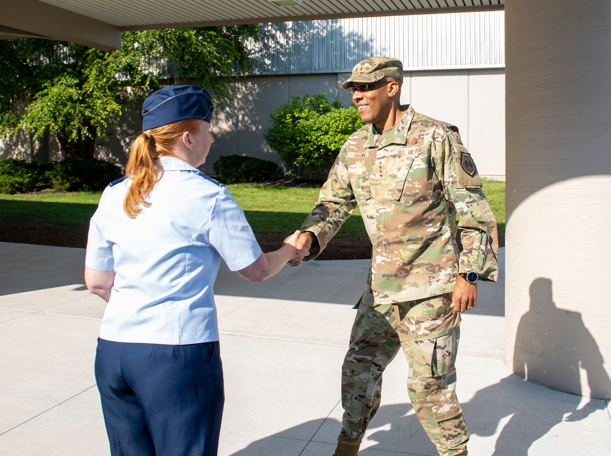 Air Force Chief of Staff Gen. CQ Brown, Jr. greets Col. Laura Bunyan, NASIC vice commander, at Wright-Patterson Air Force Base, July 31, 2023. This is Brown’s fourth visit to NASIC, and he stated his appreciation for the work NASIC does to support the National Defense Strategy and coined several top performers during his visit.