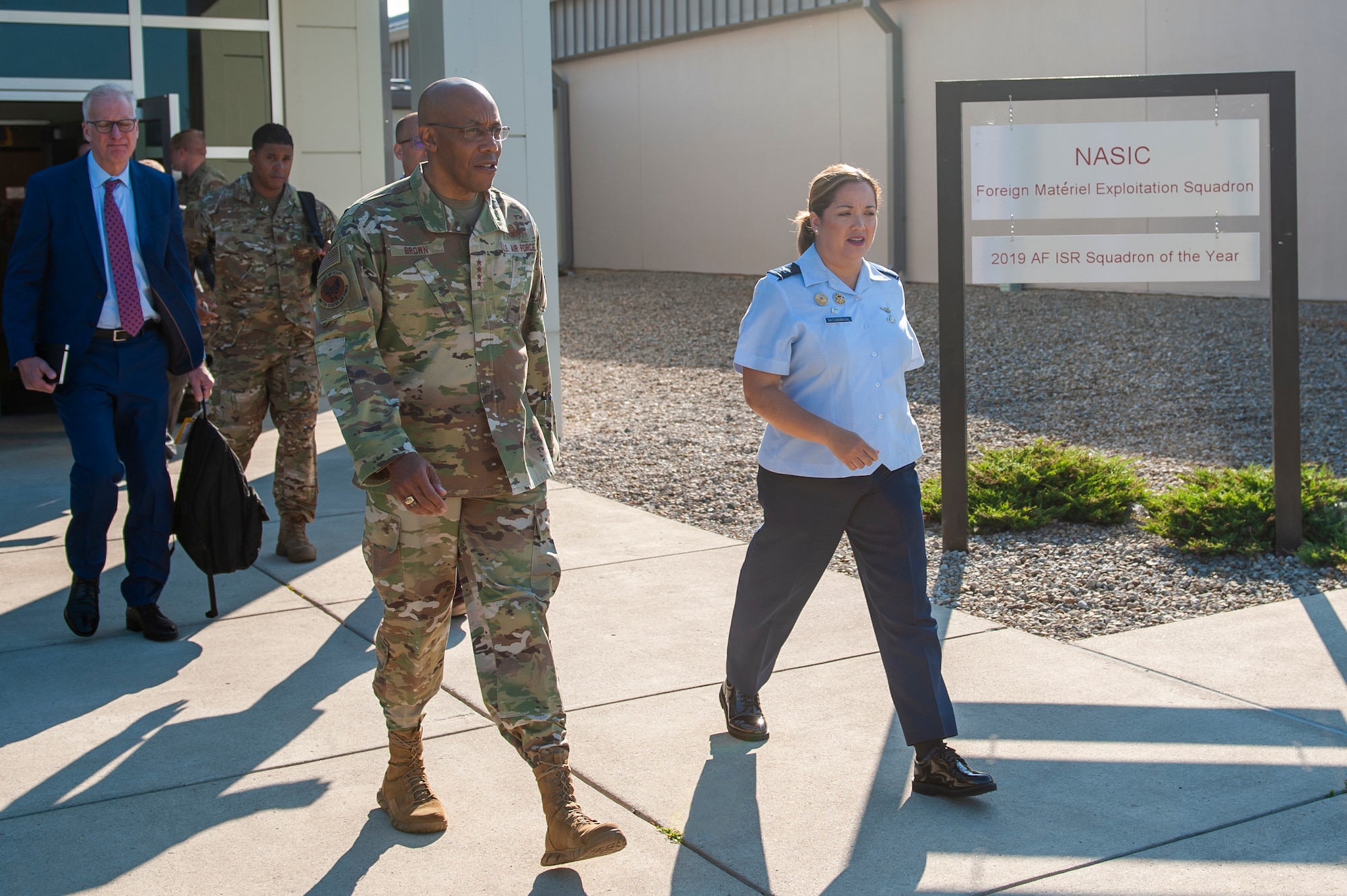 Air Force Chief of Staff Gen. CQ Brown, Jr. chats with Col. Ariel G. Batungbacal, National Air and Space Intelligence Center commander, as they exit NASIC’s Foreign Materiel Exploitation (FME) facility, Wright-Patterson Air Force Base, Ohio, July 31, 2023. FME was Brown’s first stop on his tour of NASIC, where he attended a series of intelligence briefings from subject matter experts and discussed top National Defense Strategy priorities.