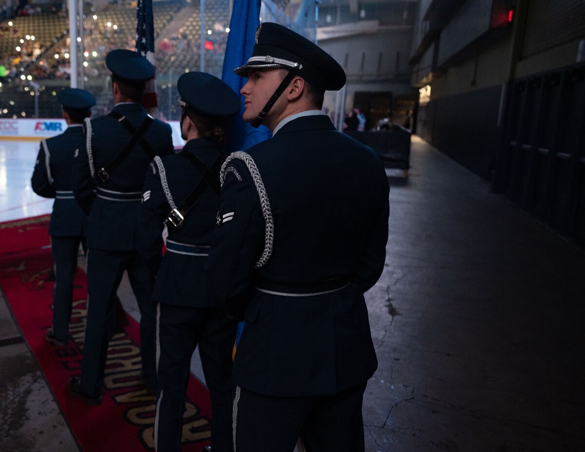 The 355th Wing Honor Guard prepares to post the colors at a Tucson Roadrunners hockey game in Tucson, Ariz., Nov. 4, 2023. The Honor Guard ceremoniously presented the flags for military appreciation night.  (U.S. Air Force photo by Airman 1st Class Robert Allen Cooke III)