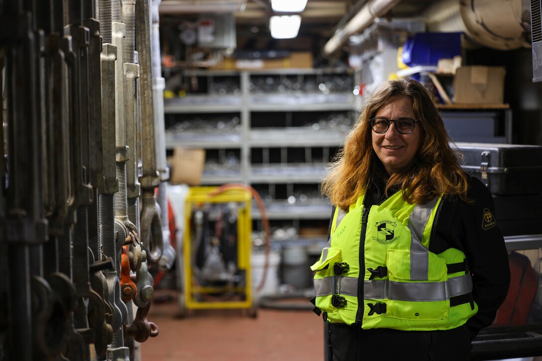 Kristen Haga, a U.S. Army Corps of Engineers safety specialist, provides occupational safety oversight on the Medium Capacity Fleet while it performs work at the Montgomery Locks and Dam in Monaca, Pennsylvania, Oct. 26, 2023.
