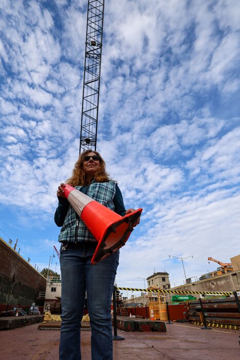 Kristen Haga, a U.S. Army Corps of Engineers safety specialist, provides occupational safety oversight on the Medium Capacity Fleet while it performs work at the Montgomery Locks and Dam in Monaca, Pennsylvania, Oct. 26, 2023.