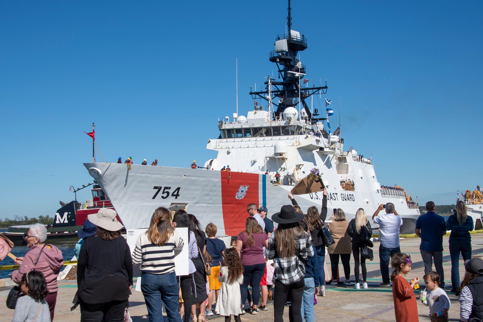 The crew of the Coast Guard Cutter James returns to the ship's homeport in North Charleston, S.C., Saturday, Nov. 4, 2023. The crew of the James conducted a 113-day patrol and conducted counter-drug operations.
