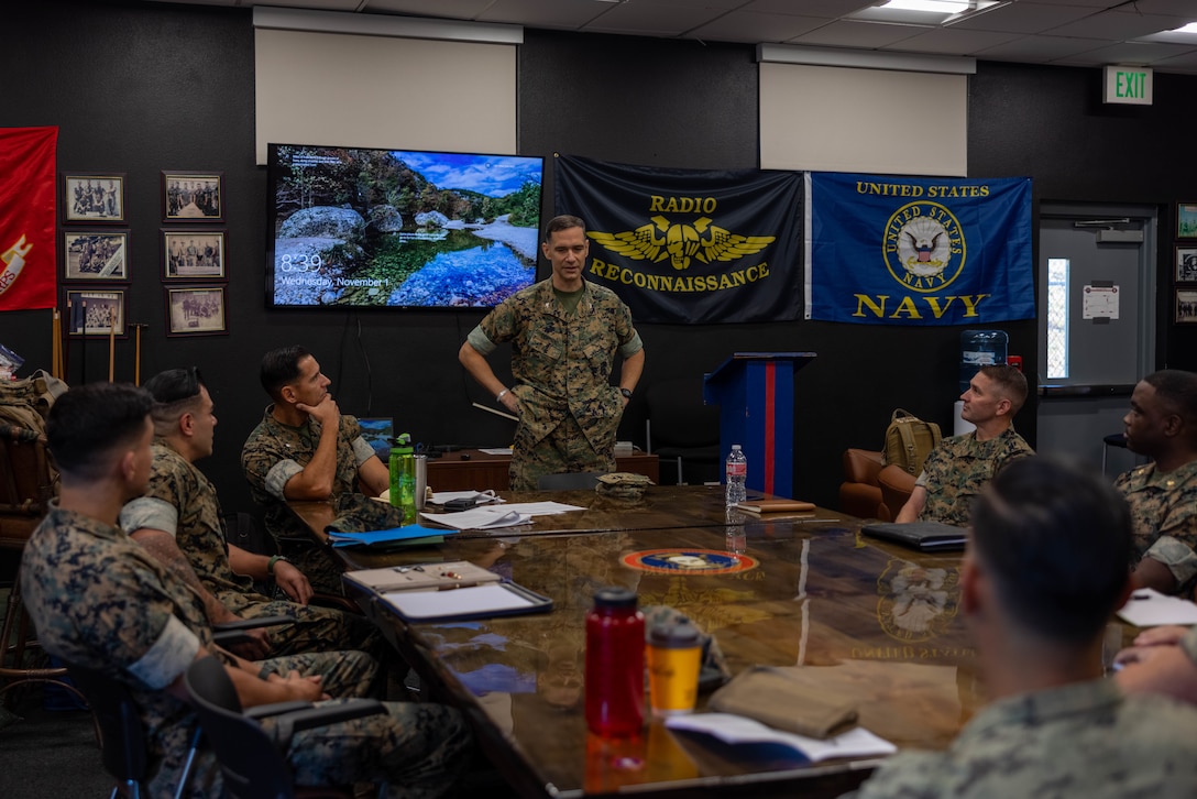 U.S. Marine Corps Col. William Osborne III, commanding officer of I Marine Expeditionary Force Information Group, shares his intentions for the I MIG Individual Mobilization Augmentee staff during an overview brief at Marine Corps Base Camp Pendleton, California, Nov. 1, 2023. During their activation, the Individual Mobilization Augmentee detachment conducted annual training requirements to ensure the reservists can seamlessly transition into I MIG operations during any future activation. (U.S. Marine Corps photo by Lance Cpl. Macie Ross)
