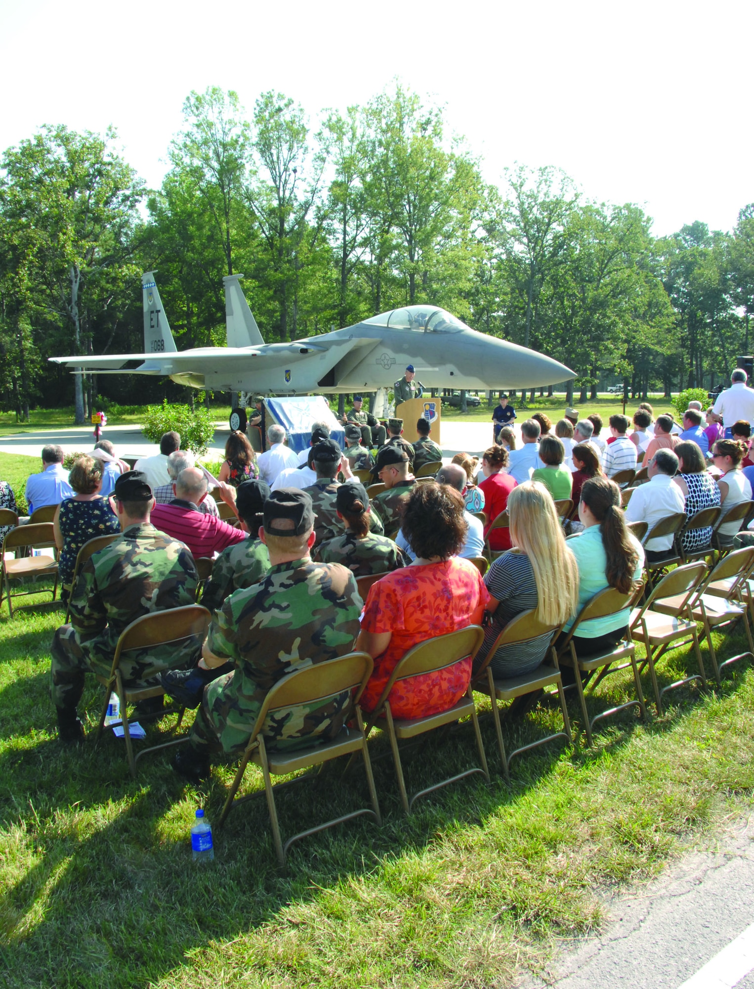 Brig. Gen. C.D. Moore II, then-commander of the 478th Aeronautical Systems Wing at Wright-Patterson Air Force Base, Ohio, speaks to attendees of the August 2007 ceremony to dedicate the F-15 Eagle static display at Arnold Air Force Base, Tenn., in memory of Maj. Jim Duricy. Duricy died April 30, 2002, when he was forced to eject at a high speed as the F-15C he piloted crashed into the Gulf of Mexico. His body was never found. A 12-year test pilot, Duricy was assigned to the 40th Flight Test Squadron based at Eglin Air Force Base, Fla., at the time of his death. He was on a captive flight development test of a new missile when the aircraft crashed. (U.S. Air Force photo by David Housch)