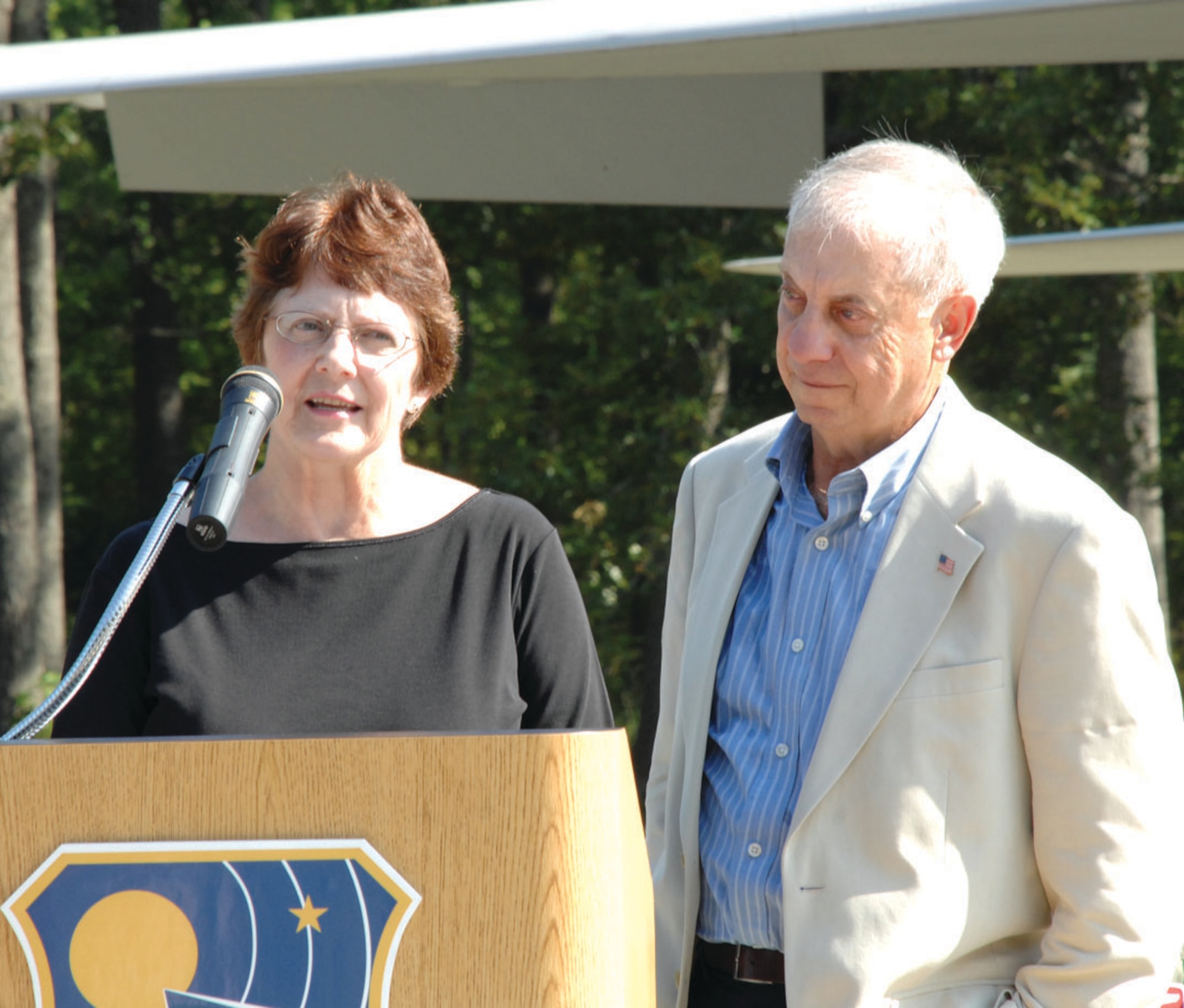 Irene and Art Duricy, parents of Maj. Jim Duricy, speak during the August 2007 ceremony to dedicate the F-15 Eagle static display at Arnold Air Force Base, Tenn., in memory of their son. Maj. Duricy died April 30, 2002, when he was forced to eject at a high speed as the F-15C he piloted crashed into the Gulf of Mexico. His body was never found. A 12-year test pilot, Maj. Duricy was assigned to the 40th Flight Test Squadron based at Eglin Air Force Base, Fla., at the time of his death. He was on a captive flight development test of a new missile when the aircraft crashed. (U.S. Air Force photo by David Housch)