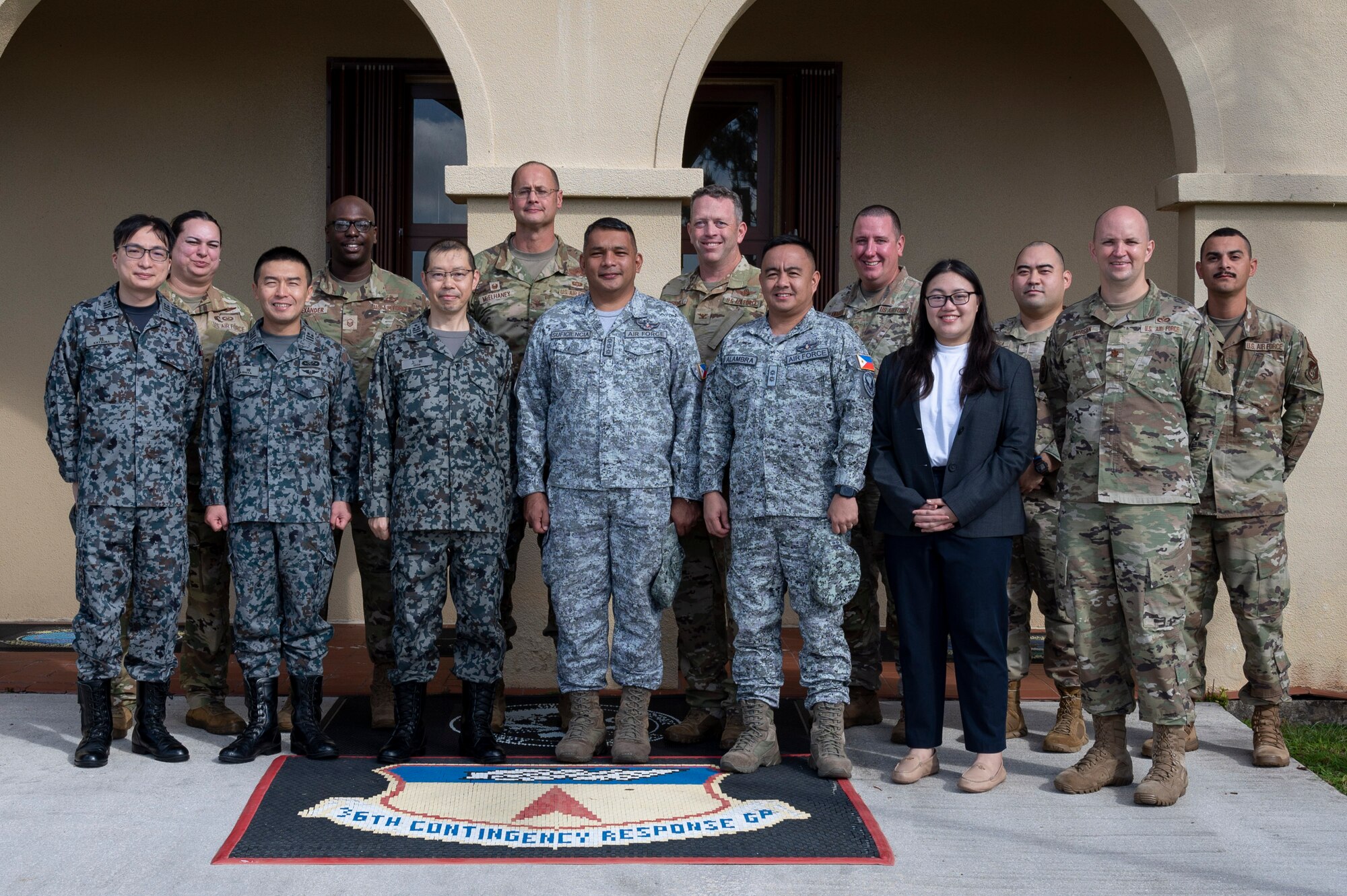 U.S. Air Force, Philippine Air Force and Japan Air Self-Defense Force leaders pose for a photo at Andersen Air Force Base, Guam, Nov. 2, 2023. The 36th Contingency Response Group and the 36th Tactical Advisory Squadron hosted a trilateral discussion to facilitate discussions on regional security concerns, humanitarian aid and disaster relief, exercises, and operations. (U.S. Air Force photo by Senior Airman Emily Saxton)