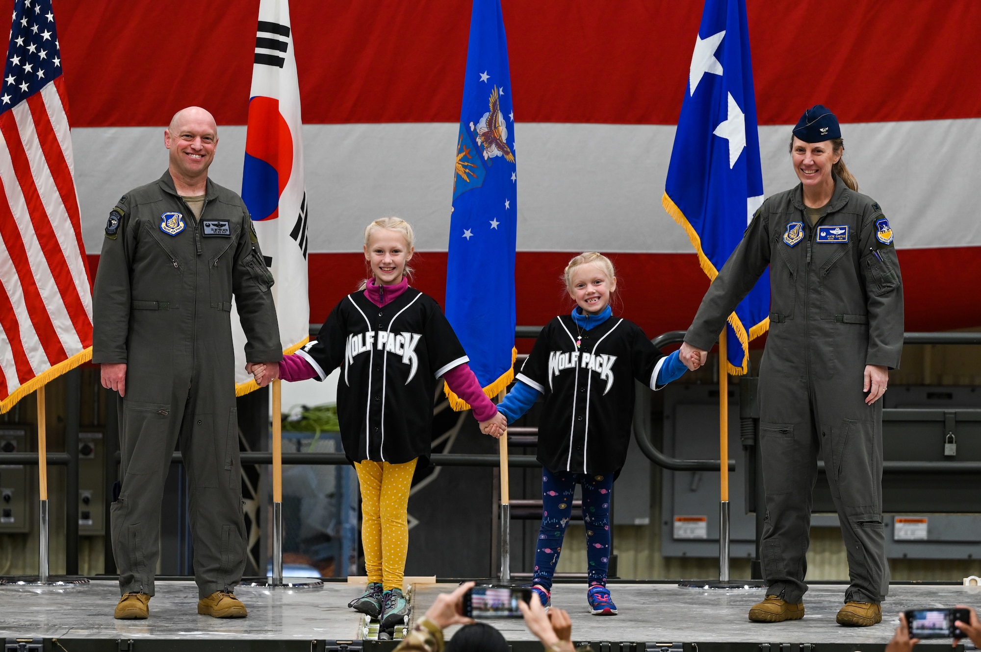 Col. Matthew C. Gaetke gathers for a group photo with his wife, Col. Kathryn Gaetke, and their children during the 8th FW Assumption of Command ceremony.