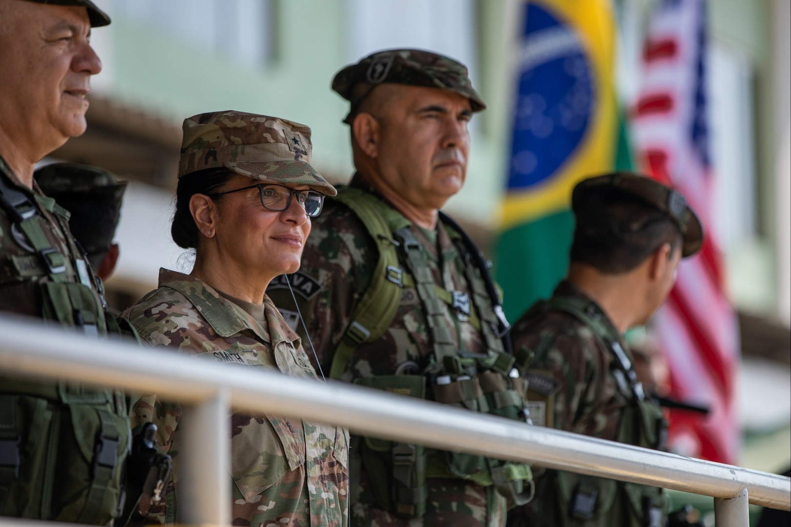 New York Army National Guard Brig. Gen. Isabel Smith, center, director, Joint Staff, New York National Guard, stands with Brazilian Army officers during the opening ceremony for Exercise Southern Vanguard 24 in Macapa, Brazil, Nov. 6, 2023. The exercise is designed for U.S. Army Soldiers to conduct pre-deployment activities, deploy and conduct air assault operations while enhancing interoperability with Brazilian army forces.