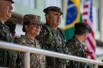 New York Army National Guard Brig. Gen. Isabel Smith, center, director, Joint Staff, New York National Guard, stands with Brazilian Army officers during the opening ceremony for Exercise Southern Vanguard 24 in Macapa, Brazil, Nov. 6, 2023. The exercise is designed for U.S. Army Soldiers to conduct pre-deployment activities, deploy and conduct air assault operations while enhancing interoperability with Brazilian army forces.