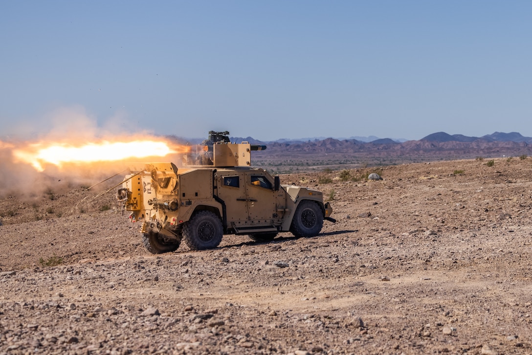 U.S. Marines with the Combined Anti-Armor Team, 3rd Battalion, 2d Marine Regiment, 2d Marine Division fire a TOW missile from a Joint Light Tactical Vehicle during a range on the U.S. Army Yuma Proving Grounds, Arizona, Oct 21, 2023. CAAT utilizes various weapon systems to neutralize enemy armored assets.