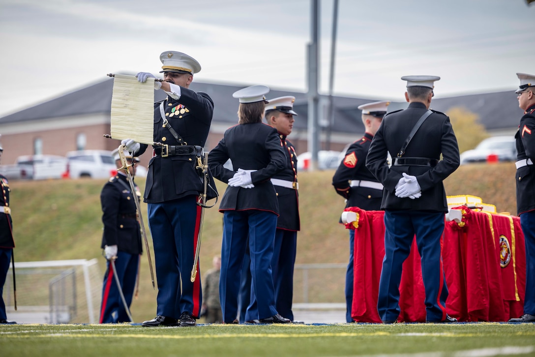 U.S. Marine Corps Capt. Moses Menchaca, battalion adjutant, Security Battalion, a native of Patterson, California, delivers the birthday message during the cake cutting ceremony in honor of the 248th Marine Corps birthday at Butler Stadium on Marine Corps Base Quantico, Virginia, Nov. 7, 2023. The annual cake cutting ceremony is a long-standing tradition which celebrates the establishment of the United States Marine Corps. The Marine Corps birthday is celebrated every year to commemorate the birth of the Corps and honor the service and sacrifices of all Marines, past and present. (U.S. Marine Corps photo by Lance Cpl. Joaquin Dela Torre)