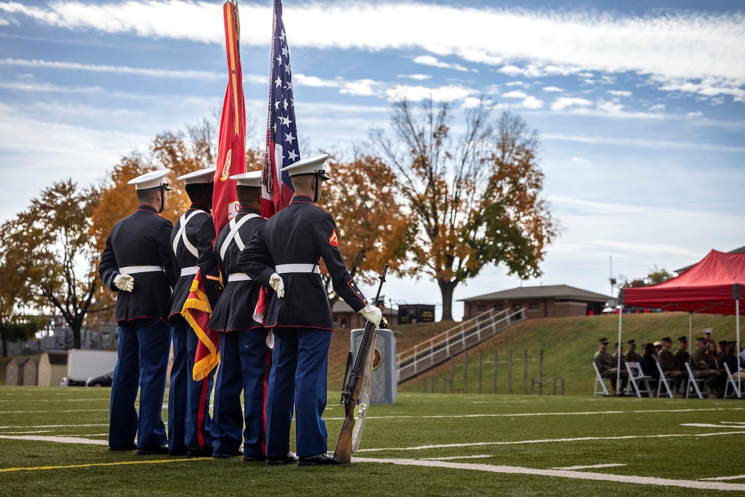 U.S. Marines with the Marine Corps Base Quantico color guard, retire the colors during the cake cutting ceremony in honor of the 248th Marine Corps birthday at Butler Stadium on MCB Quantico, Virginia, Nov. 7, 2023. The annual cake cutting ceremony is a long-standing tradition which celebrates the establishment of the United States Marine Corps. The Marine Corps birthday is celebrated every year to commemorate the birth of the Corps and honor the service and sacrifices of all Marines, past and present. (U.S. Marine Corps photo by Lance Cpl. Joaquin Dela Torre)