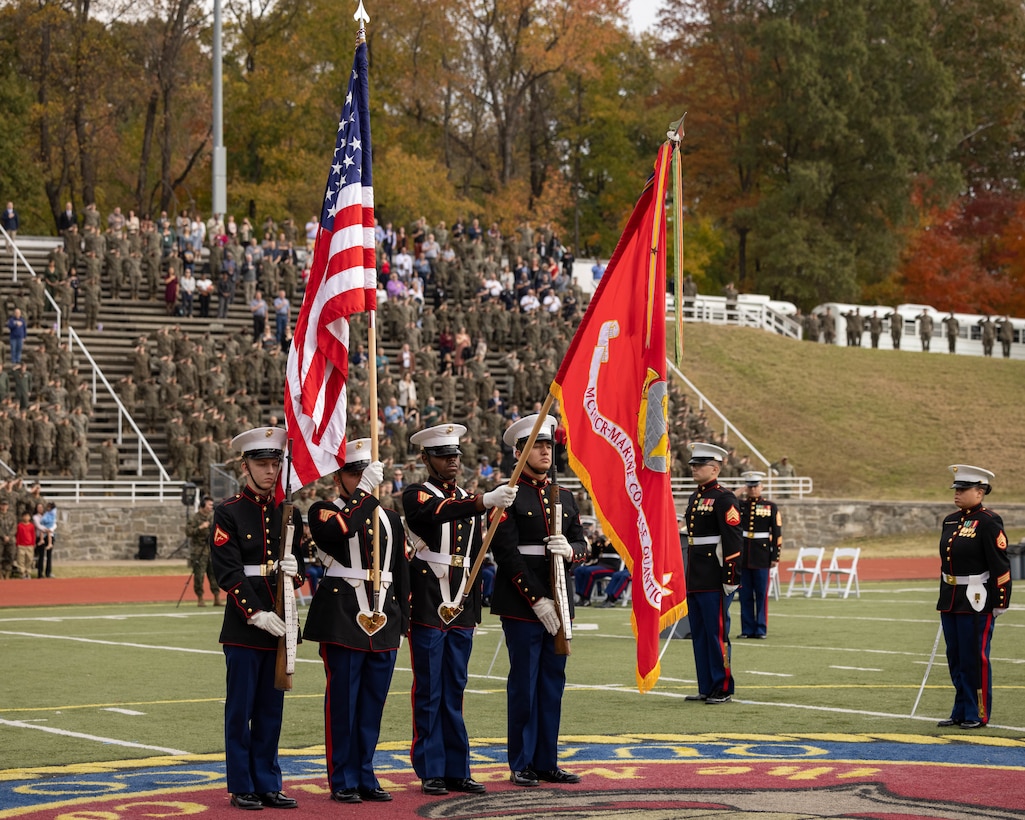 U.S. Marines with Marine Corps Base Quantico Color Guard present colors during the Marine Corps cake cutting ceremony in honor of the 248th Marine Corps Birthday at Butler Stadium on MCBQ, Virginia, Nov. 7, 2023. The annual cake cutting ceremony is a long-standing tradition that celebrates the establishment of the United States Marine Corps. The Marine Corps birthday is celebrated every year to commemorate the birth of the Corps and honor the service and sacrifices of all Marines, past and present. (U.S. Marine Corps photo by Cpl. Mitchell Johnson)