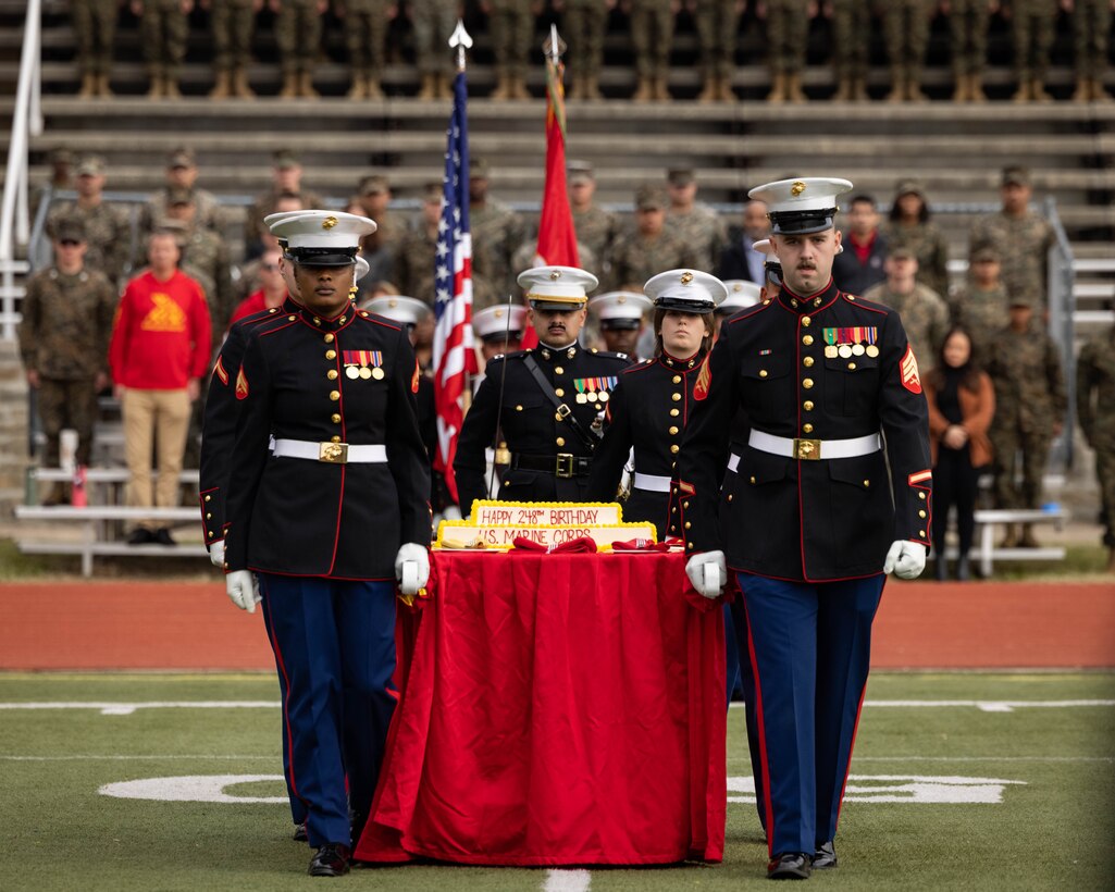 U.S. Marines present the cake during the Marine Corps cake cutting ceremony in honor of the 248th Marine Corps Birthday at Butler Stadium on MCBQ, Virginia, Nov. 7, 2023. The annual cake cutting ceremony is a long-standing tradition that celebrates the establishment of the United States Marine Corps. The Marine Corps birthday is celebrated every year to commemorate the birth of the Corps and honor the service and sacrifices of all Marines, past and present. (U.S. Marine Corps photo by Cpl. Mitchell Johnson)