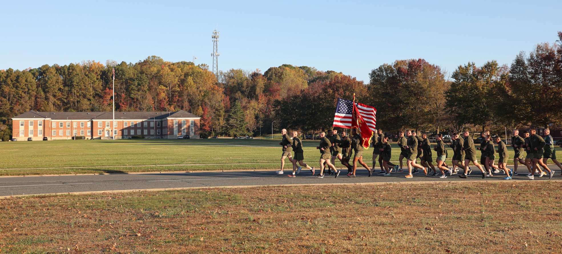 U.S. Marine Corps Lt. Gen. James Glynn, Deputy Commandant for Manpower and Reserve Affairs, a native of Albany, New York, left, and Sgt. Maj. Jacob Rieff, Sergeant Major of M&RA, a native of Wisconsin, right, lead a running formation honoring the Marine Corps Birthday on Marine Corps Base Quantico, Virginia, Nov. 3, 2023. The formation run promoted unit cohesion, physical fitness and celebrated the 248nd Marine Corps Birthday. (U.S. Marine Corps photo by Lance Cpl. David Brandes)