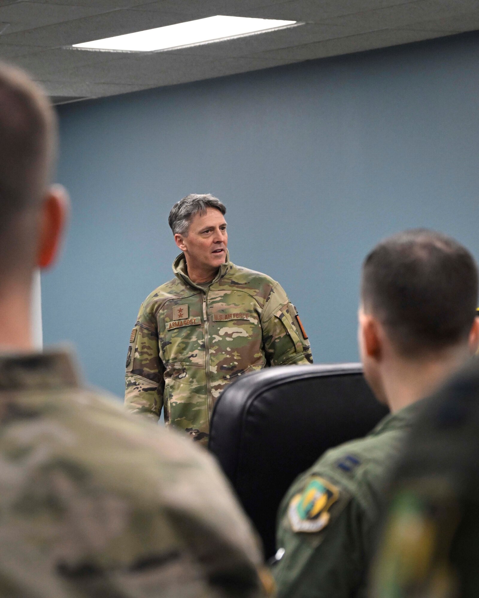 U.S. Air Force Major General Jason R. Armagost, Eighth Air Force and Joint-Global Strike Operations Center commander, speaks to aircrew members from the 23rd and 69th Bomb Squadron at Minot Air Force Base, North Dakota, Nov. 1, 2023. During the visit, Armagost interacted with members of Team Minot and gained a deeper understanding of how they execute the global deterrence mission. (U.S. Air Force photo by Senior Airman Caleb S. Kimmell)