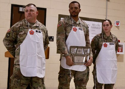 Staff Sgt. Justin Hill of Robinson, Illinois; Spc. Jordan Robinson of Danville, Illinois; and Spc. Samantha Vazquez of Norwood, Illinois. were honored by Chief Warrant Officer 3 Melissa Downey, the Illinois Army National Guard's food service officer, and Command Sgt. Maj. Nicholaus Fordham, the command sergeant major of the 198th Combat Sustainment Support Battalion and the fulltime Illinois Army National Guard logistics sergeant major.