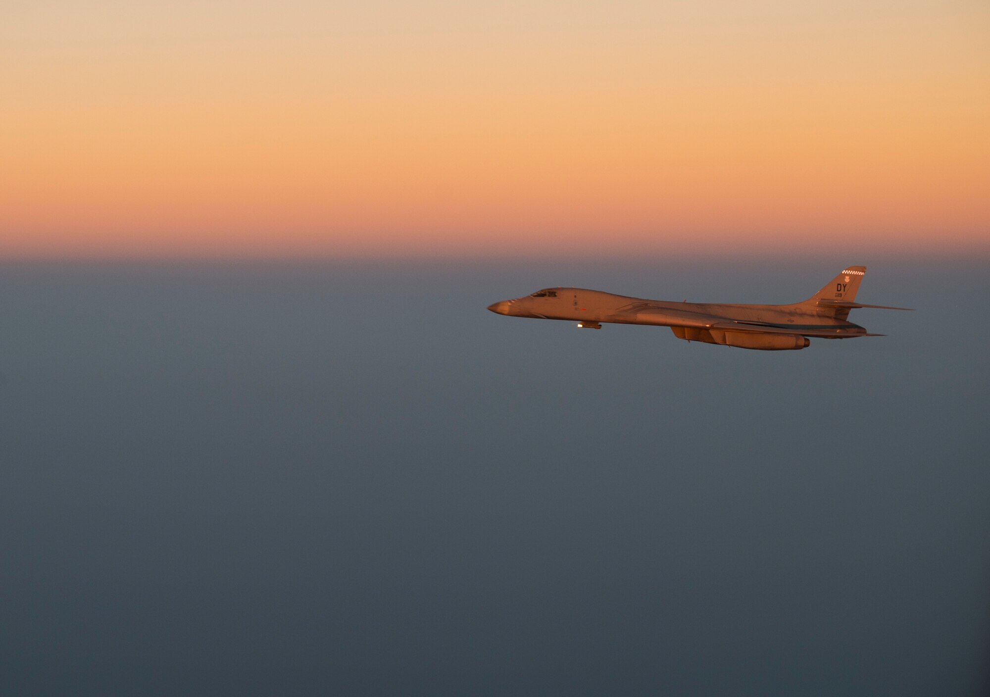 A B-1 Lancer flies over an undisclosed location.