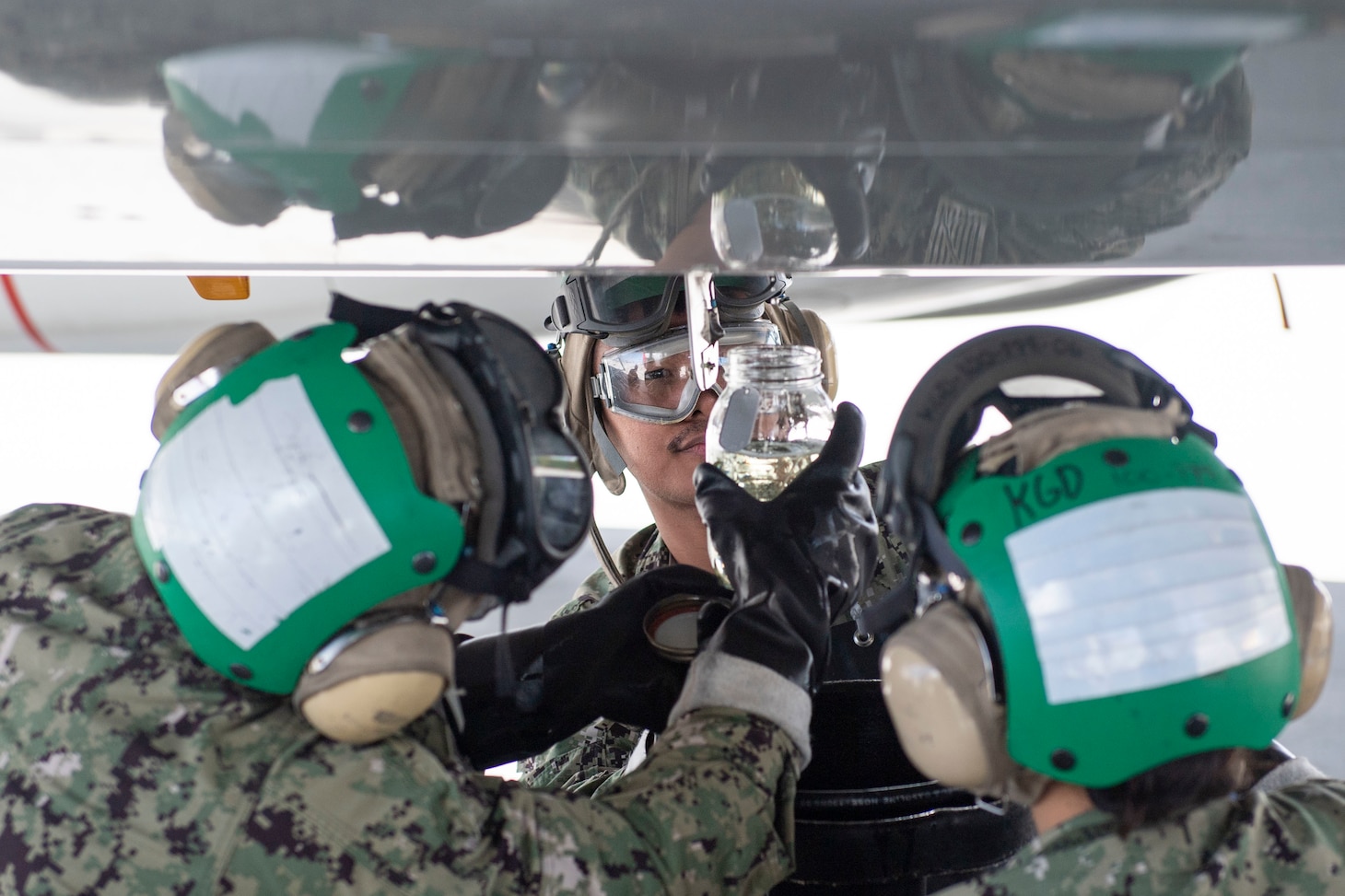 Sailors assigned to the maintenance department of the "Conquistadors" of Fleet Logistics Squadron (VR) 57 conduct training on fuel surveillance.