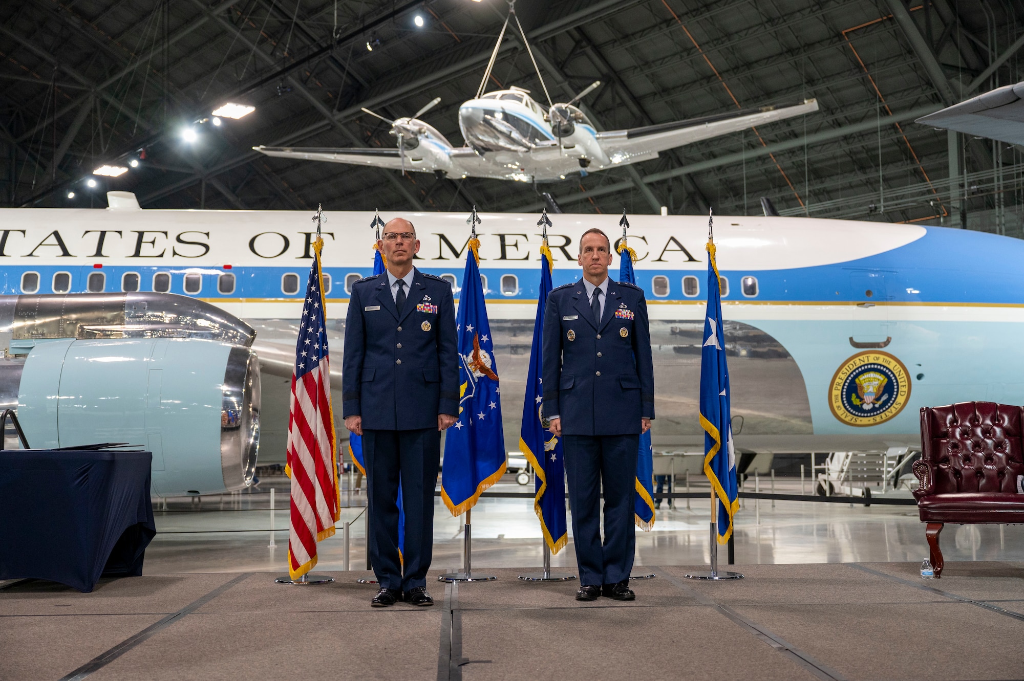 Gen. Duke Z. Richardson (left), Commander, Air Force Materiel Command, and Lt. Gen. Shaun Q. Morris, Air Force Life Cycle Management Center commander, stand for the presentation of certificates during Morris’ retirement ceremony.