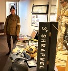 Amy Cawley, a volunteer with the First Infantry Division Museum at Cantigny Park in Wheaton, Illinois, portrays a World War I American Red Cross ambulance driver as part of the Illinois State Military Museum's Great War Encampment, Nov. 4, at the Illinois National Guard headquarters in Springfield, Illinois.