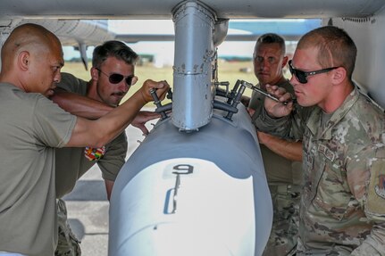 U.S. Air Force maintainers assigned to the 175th Aircraft Maintenance Squadron, 175th Wing, Maryland National Guard, install travel pods on an A-10C Thunderbolt II aircraft after their final training sortie during exercise Air Defender 2023, June 22, 2023, at Jagel Air Base, Germany.