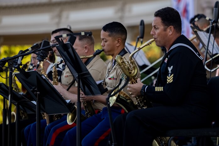 U.S. service members in the U.S. Navy Band Southwest and the U.S. Marine Corps Band San Diego, perform at Balboa Park Organ Pavilion, California, Nov. 3, 2023, in support of a San Diego Fleet Week 2023. The purpose of Fleet Week is to showcase the capabilities of the Navy-Marine Corps team and give back to the community with events and personal interactions between service members and the public. (U.S. Marine Corps photo by Lance Cpl. Jacob B. Hutchinson)