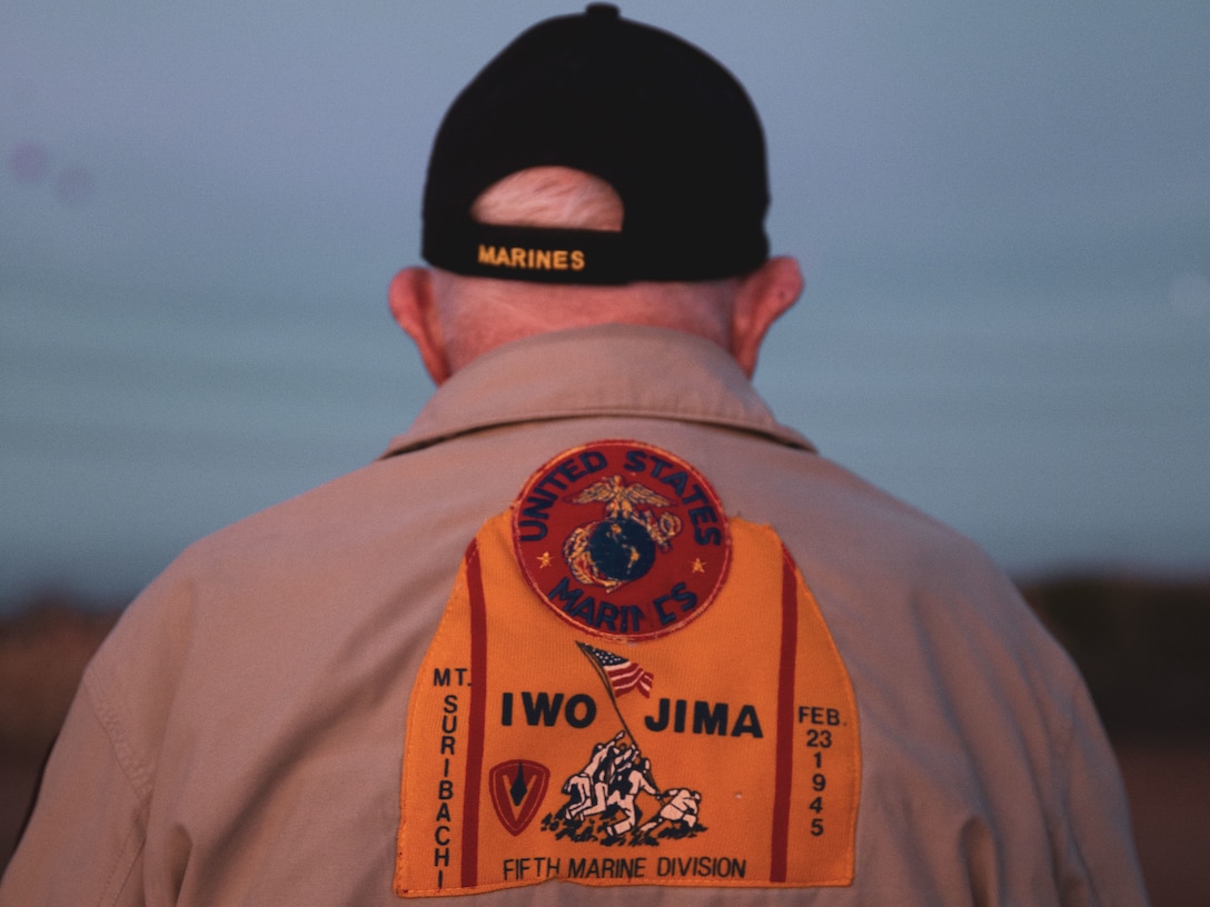 U.S. Marine Corps veteran Cpl. Don Graves watches as recruits with Alpha Company, 1st Recruit Training Battalion, are awarded their Eagle Globe and Anchors at Marine Corps Base Camp Pendleton, California, Nov. 1, 2023. Graves, a distinguished WWII veteran who served with the 2nd Battalion, 28th Marine Regiment at Iwo Jima, visited Marine Corps Recruit Depot San Diego to observe training and interact with the Marines. (U.S. Marine Corps photo by Sgt. Sydney Smith)