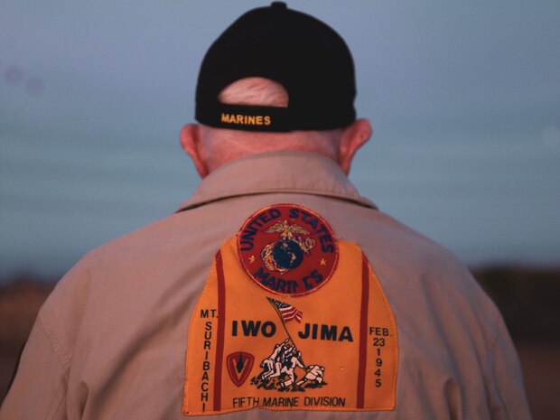U.S. Marine Corps veteran Cpl. Don Graves watches as recruits with Alpha Company, 1st Recruit Training Battalion, are awarded their Eagle Globe and Anchors at Marine Corps Base Camp Pendleton, California, Nov. 1, 2023. Graves, a distinguished WWII veteran who served with the 2nd Battalion, 28th Marine Regiment at Iwo Jima, visited Marine Corps Recruit Depot San Diego to observe training and interact with the Marines. (U.S. Marine Corps photo by Sgt. Sydney Smith)