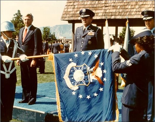  Space Command activation ceremony – 1 September 1982. In 1985, Space Command was redesignated Air Force Space Command. During the activation ceremony for Space Command, General Hartinger declared his pride at having been selected its first commander and stated, “…establishment of the Space Command is a crucial milestone in the evolution of military space operations. Space is a place – like land, and sea and air – a theatre of operations, and it was just a matter of time until space was treated as such.” Under Secretary of the Air Force Edward C. Aldridge, Jr., predicted Colorado Springs would become the military space capital of the United States. (Courtesy photo)