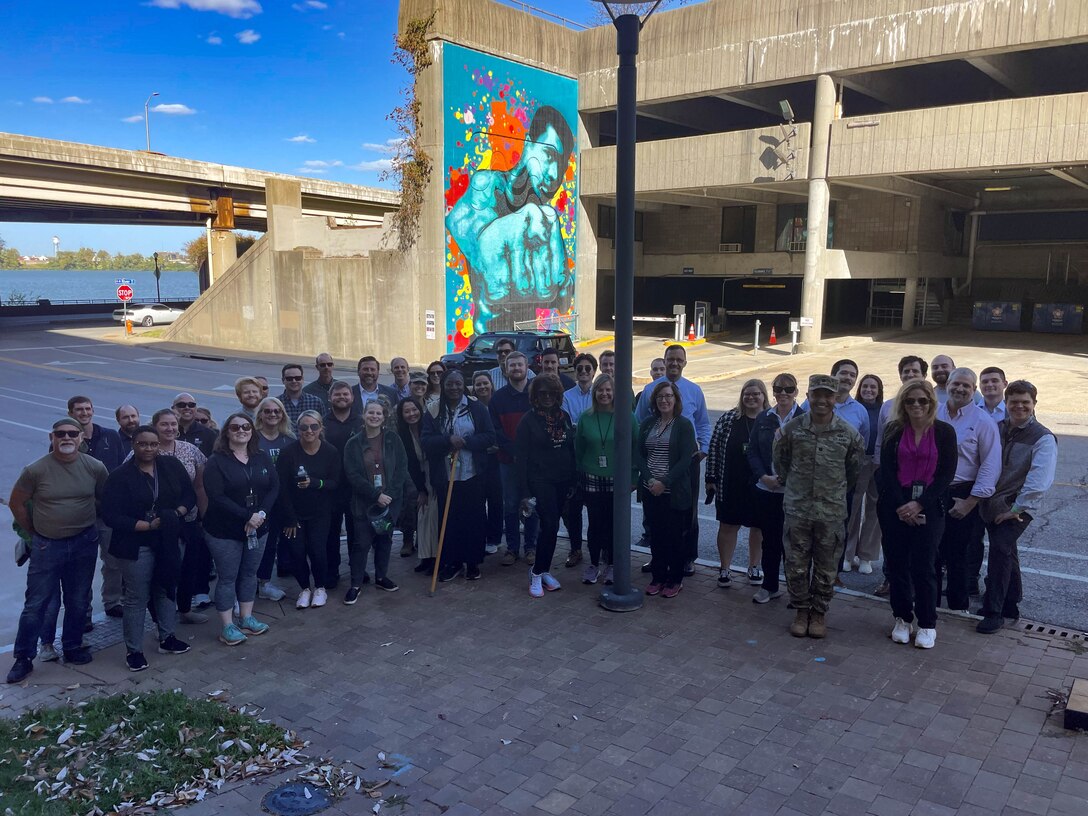 Louisville District employees gather for a photo by the Louisville Riverfront