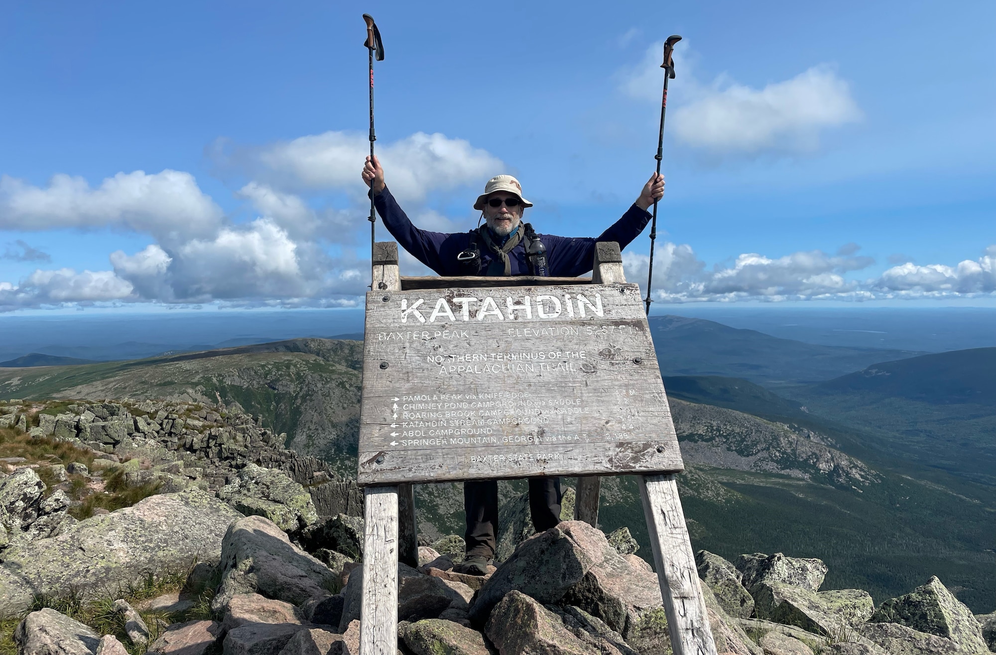 Rob Ligas reaches the top of Mount Katahdin in Maine, the Appalachian Trail’s northern endpoint, on Aug. 2, 2023. The retired Airman and longtime civilian employee at Wright-Patterson Air Force Base, Ohio, climbed the peak to close out a roughly 2,200-mile journey that began in August 2010. (Contributed photo)