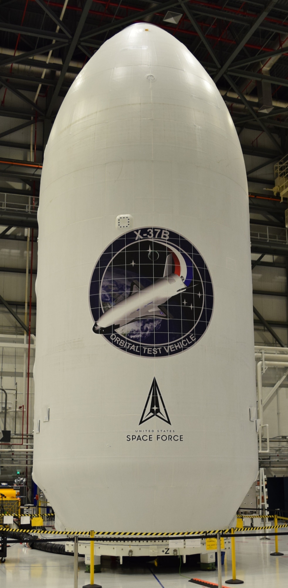 X-37B Orbital Test Vehicle is prepared for a launch from Kennedy Space Center, Fla., on Dec. 7, 2023.