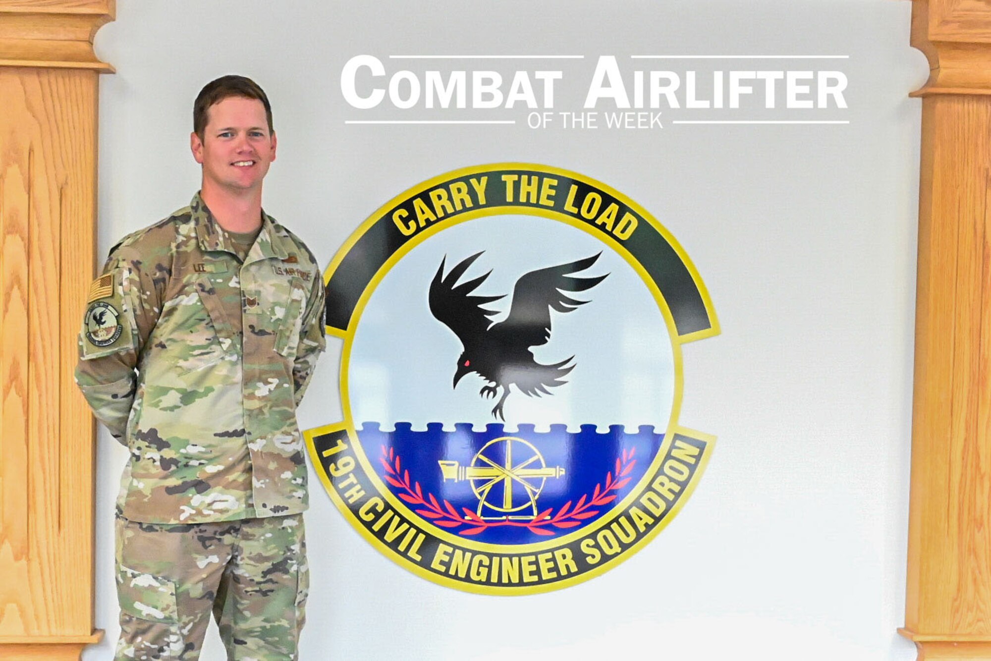 A man in uniform poses for a photo