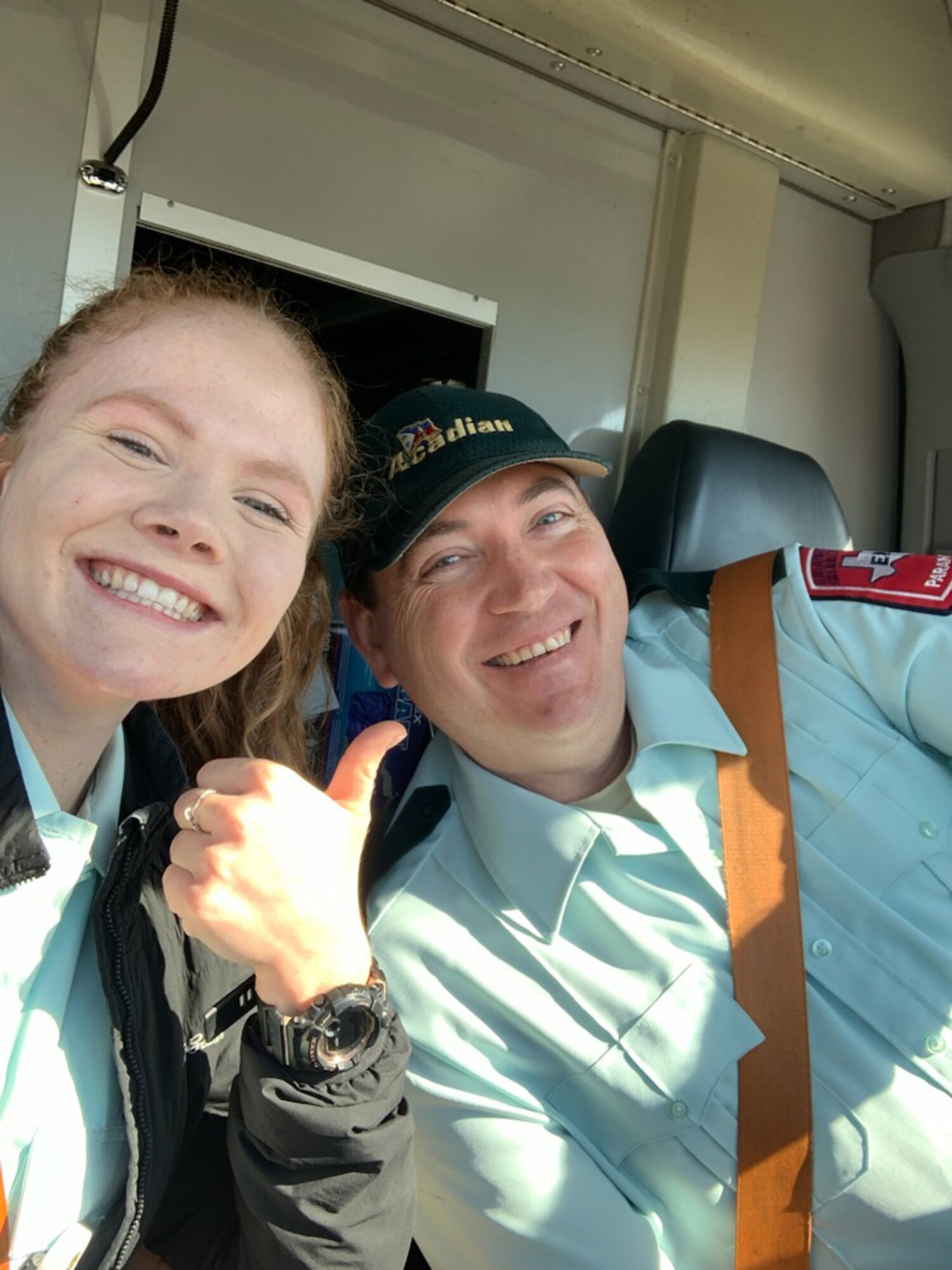 Capdedon is sitting next to former coworker, Joe Hodges, in a selfie where they are seated in an emergency response vehicle