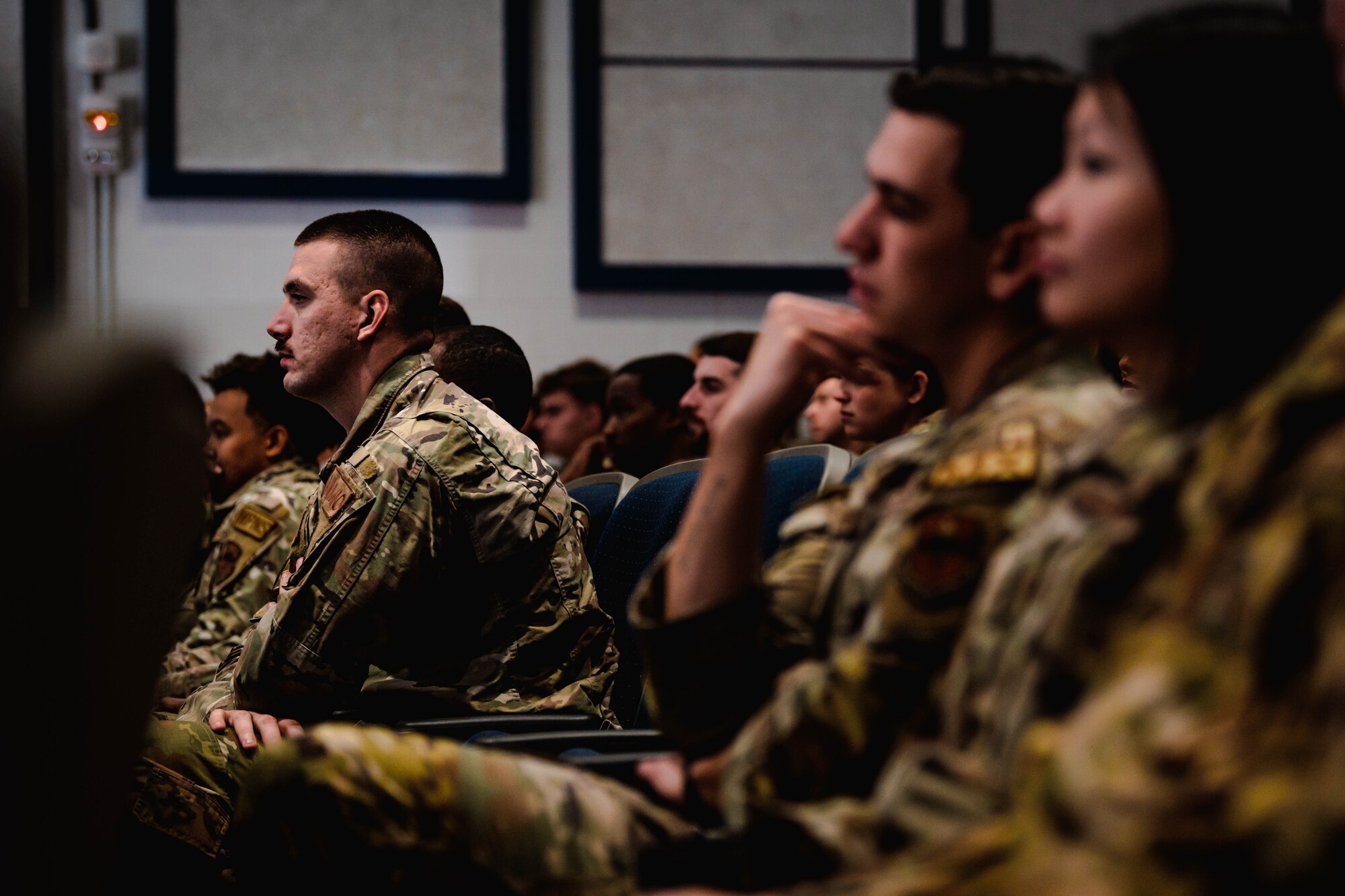 U.S. Air Force Airmen assigned to the 56th Fighter Wing listen to base leadership during a wing-wide all-call.
