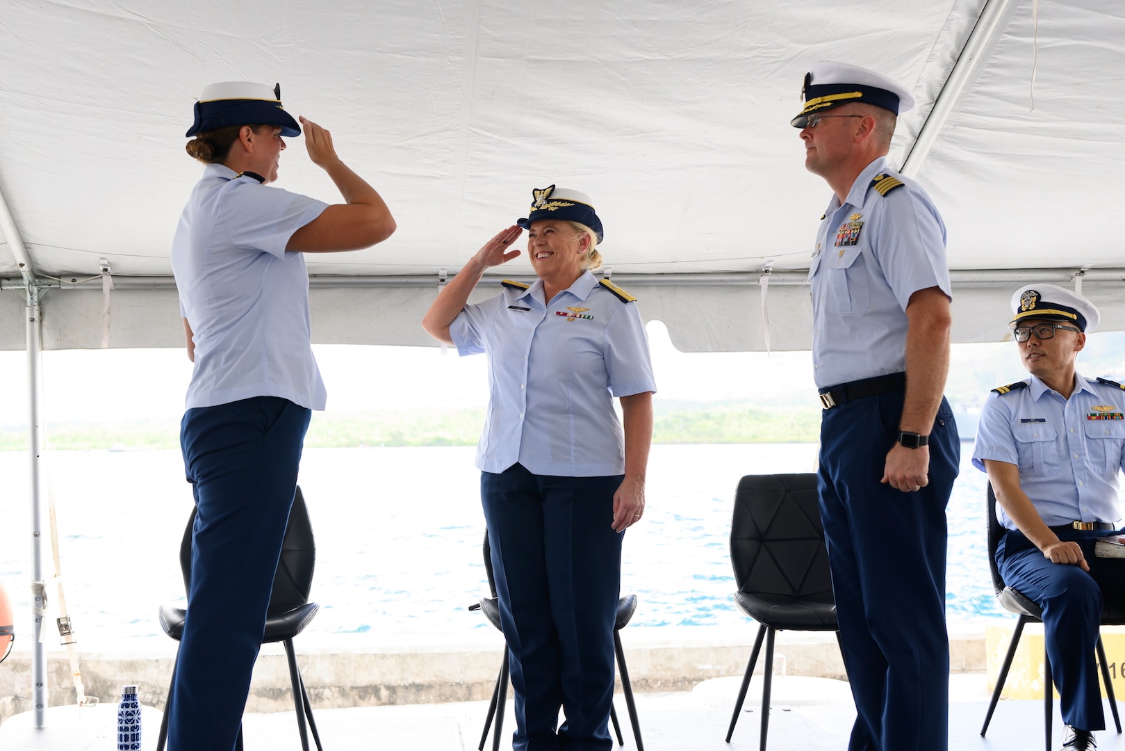 Cmdr. Dana Hiatt assumes command of U.S. Coast Guard Base Guam on Nov. 8, 2023, in a ceremony presided over by Rear Adm. Carola List, commander of Operational Logistics Command. This strategic move aligns with the Service's commitment to increase mission support throughout Oceania. Given Guam's vital importance to national security, this initiative takes center stage. (U.S. Coast Guard photo by David Lau)