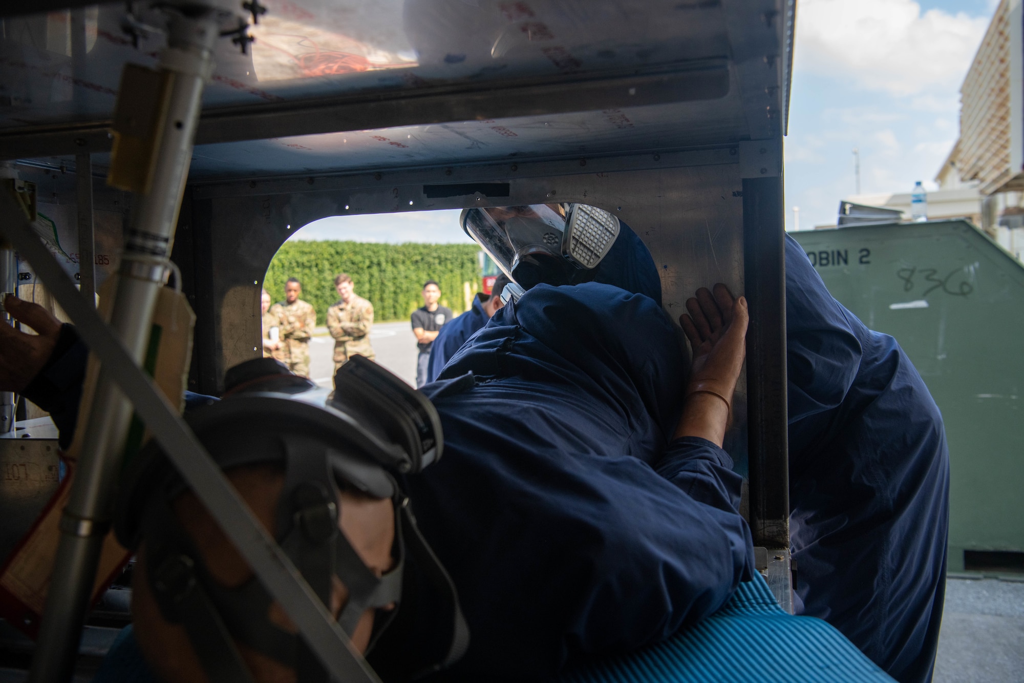 A mannequin lays in a confined space for a extraction demonstration