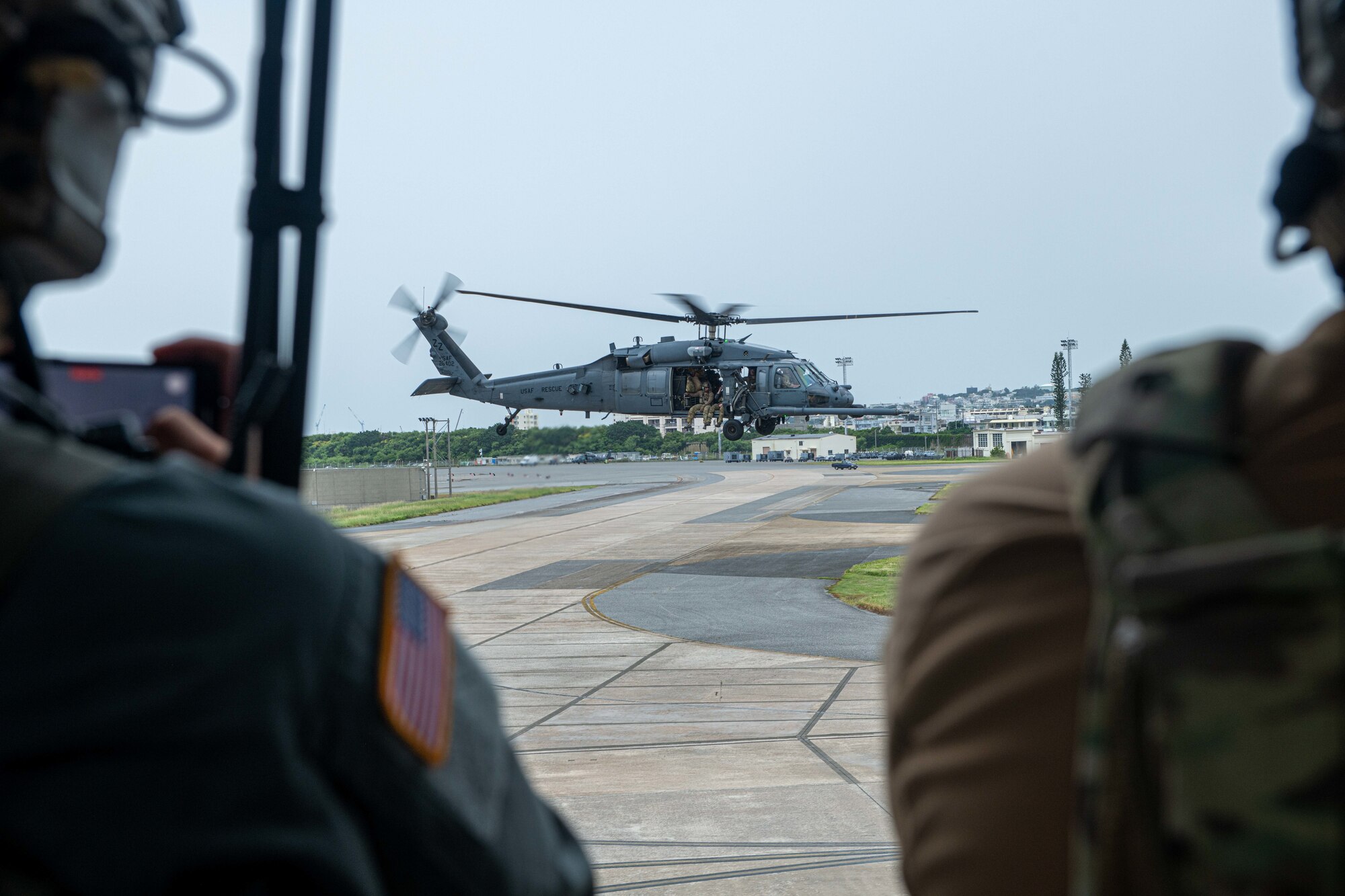 An HH-60G Pavehawk assigned to the 33rd Rescue Squadron, Kadena Air Base, Japan, takes off during Rescue Flag Okinawa 2023 at Kadena Air Base, Japan, Oct. 24, 2023.