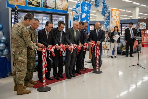 A U.S. Ambassador to Japan alongside U.S. and Japanese officials cut a ribbon