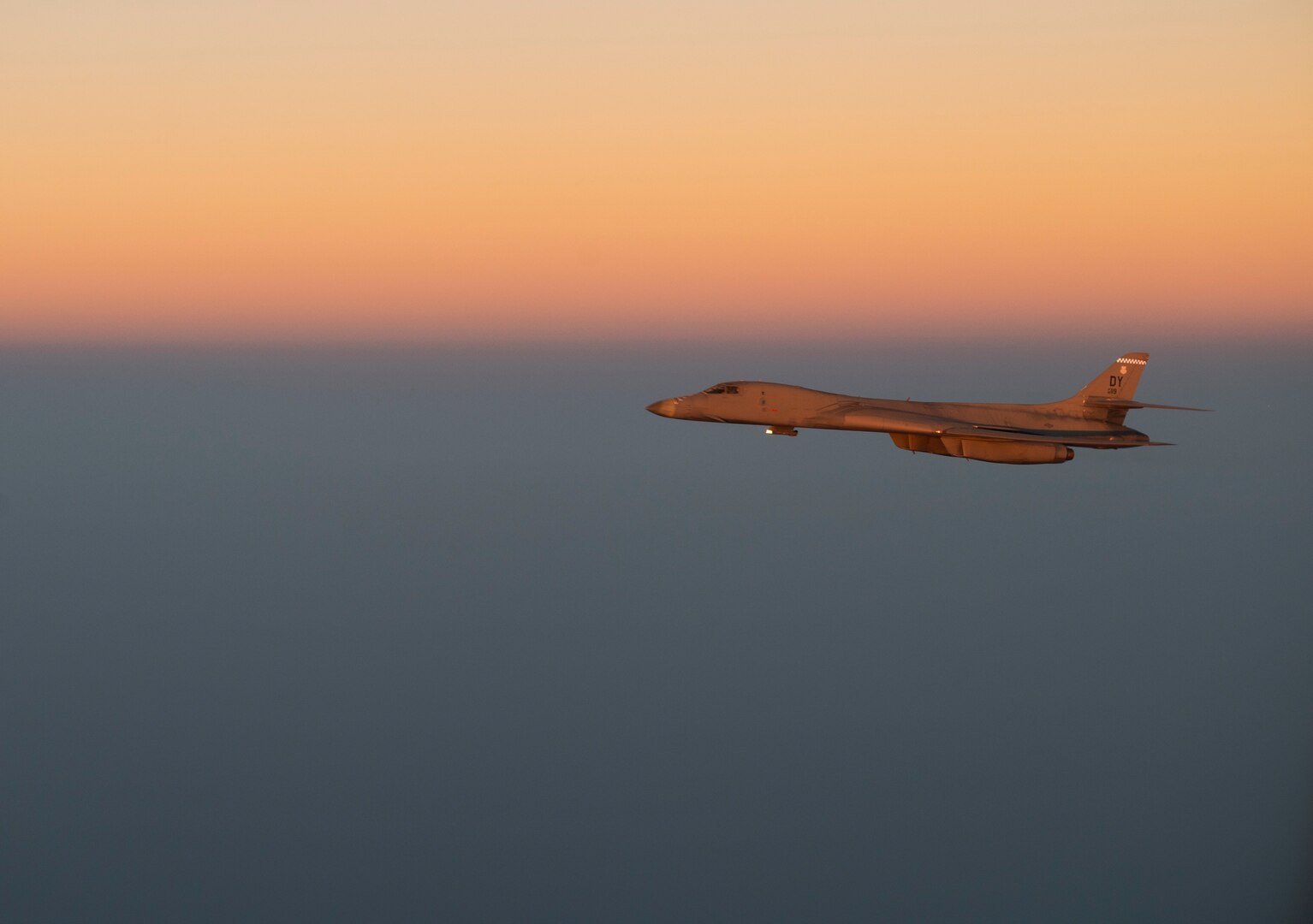A B-1 Lancer flies over an undisclosed location.