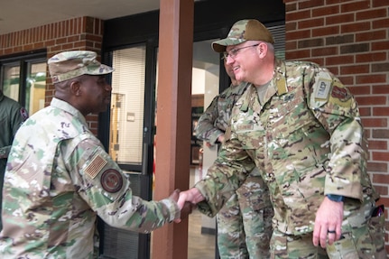 Chief Williams, left, shaking hands with Chief Stegherr.