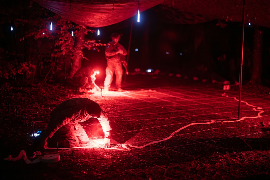 Soldiers participate in a night training exercise.